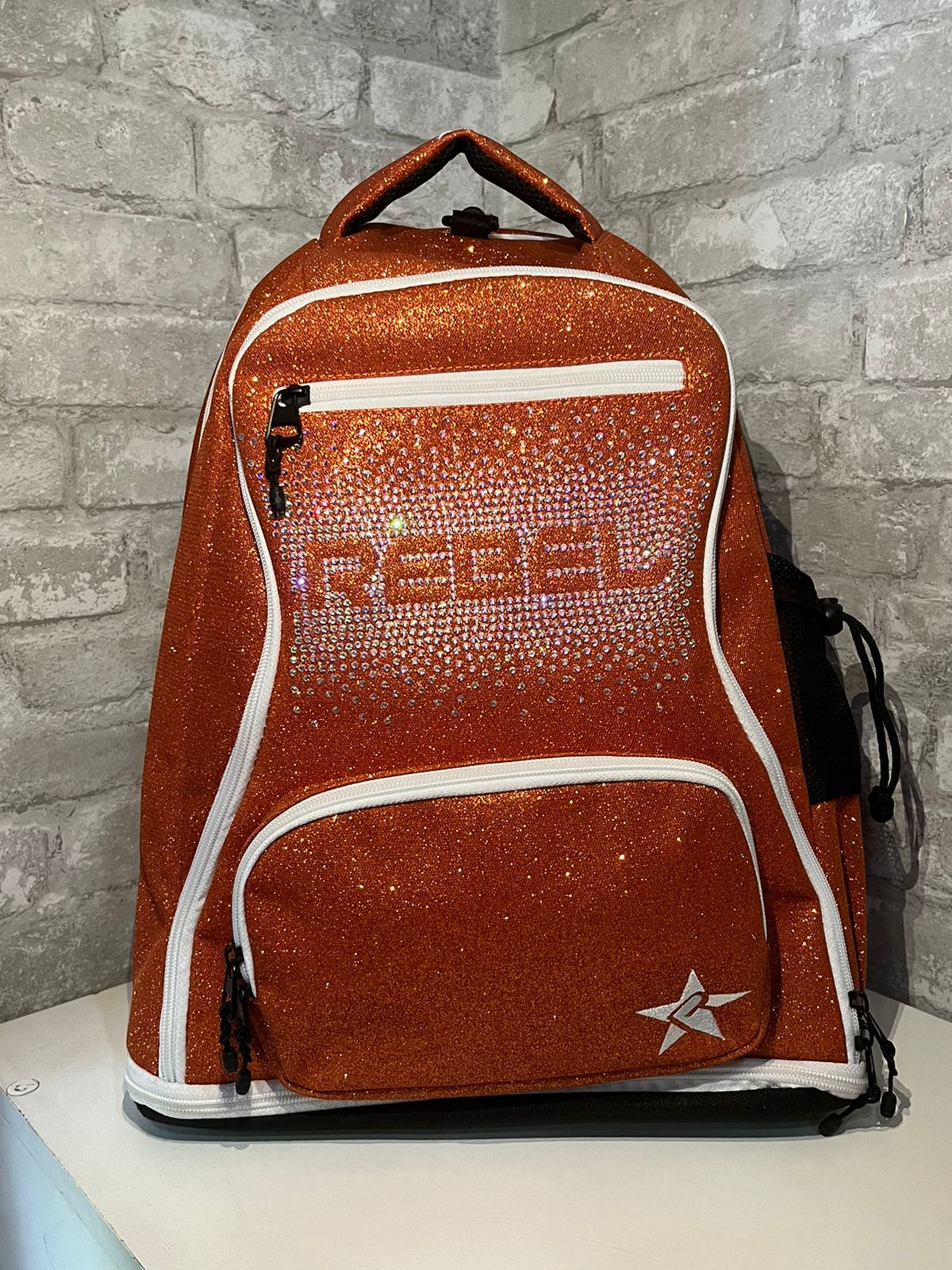 Mochila Orangesicle Rebel Athletic - Logo incluido